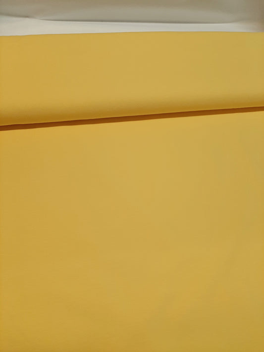 Yksivärinen trikookangas keltainen
